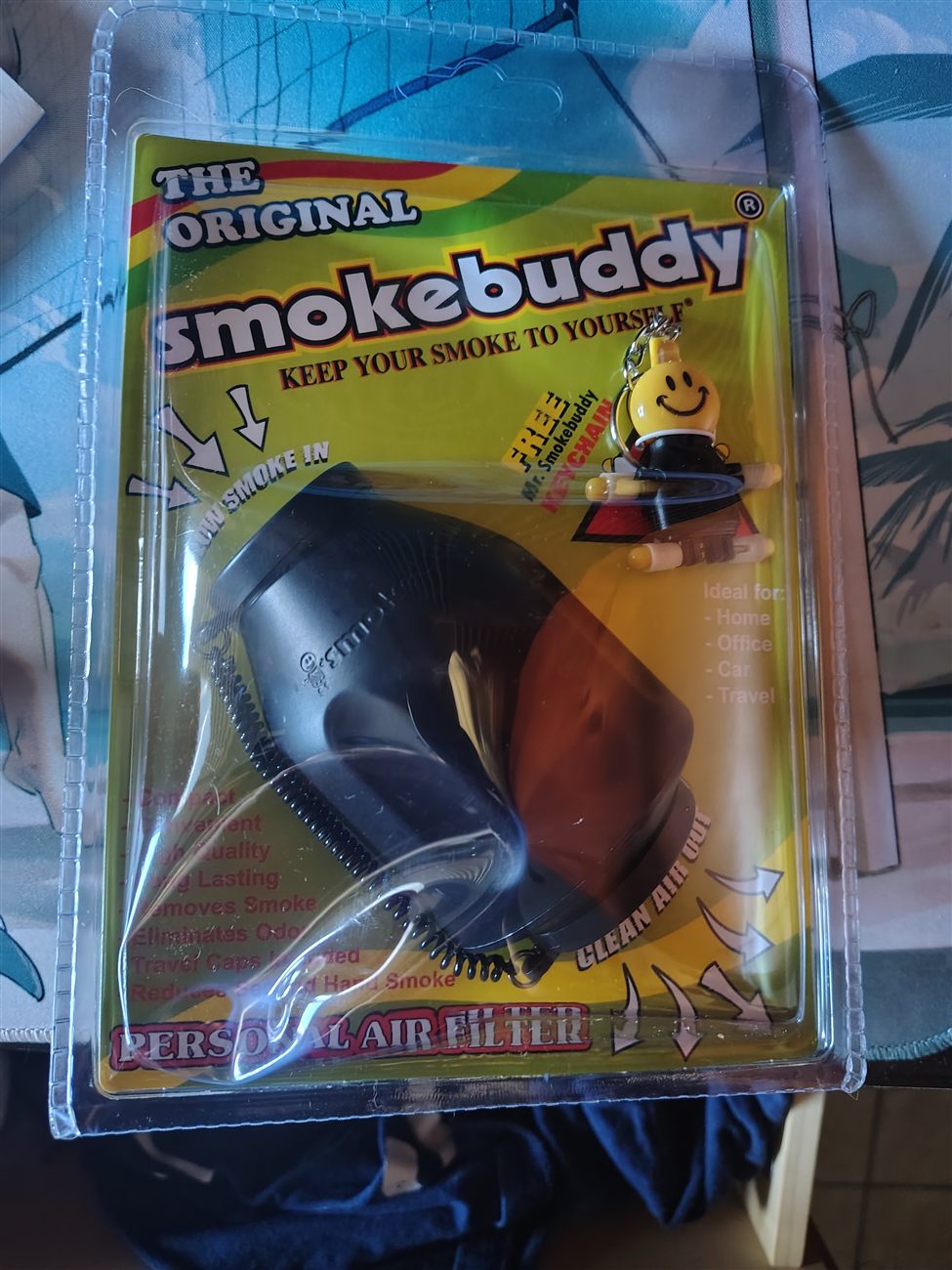 A Smokebuddy personal air filter in its retail packaging